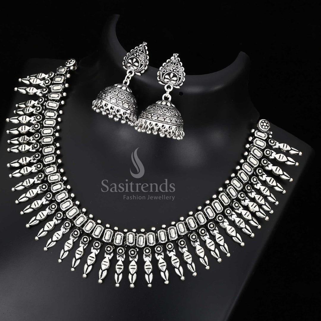 Ornamental Kolhapuri oxidised silver jewellery set with floral motifs and luxe detailing - Sasitrends