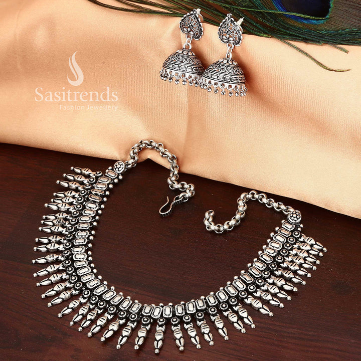 Divine Kolhapuri oxidised silver jewellery set with spiritual touches and mirror finishes - Sasitrends