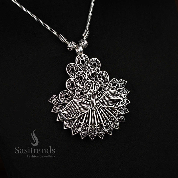 Elegant German silver oxidised chain necklace with antique feather peacock pendant, a traditional cultural jewellery piece for festive occasions – Sasitrends
