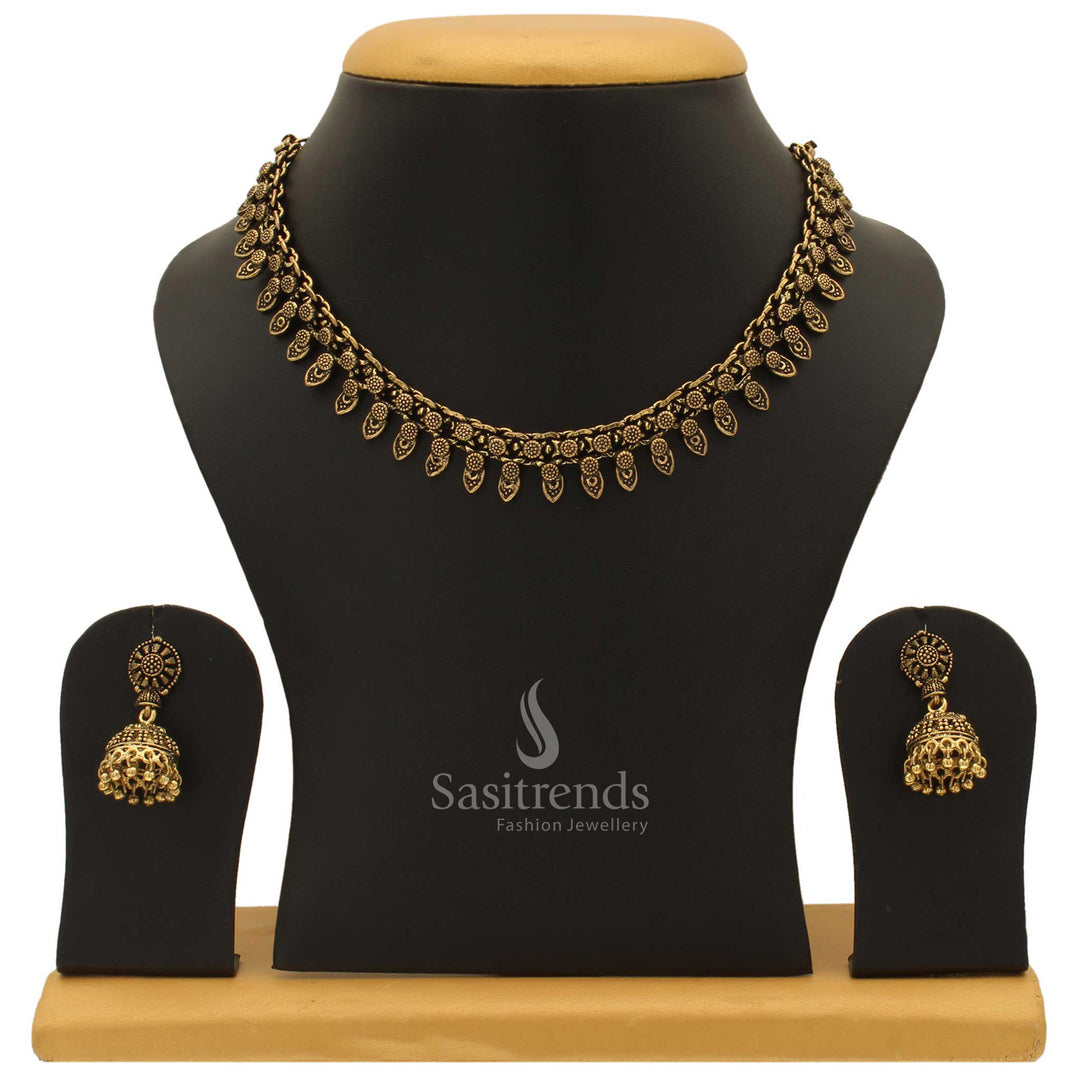 Graceful Taruni antique gold plated choker jewellery set with jhumka for women adorned with pearl drops and lotus-inspired ethnic patterns - Sasitrends
