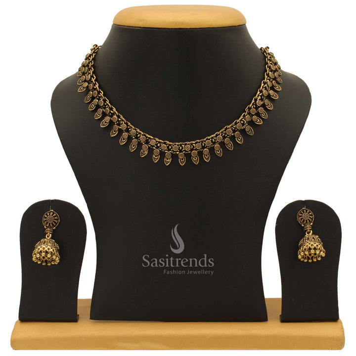 Graceful Taruni antique gold plated choker jewellery set with jhumka for women adorned with pearl drops and lotus-inspired ethnic patterns - Sasitrends