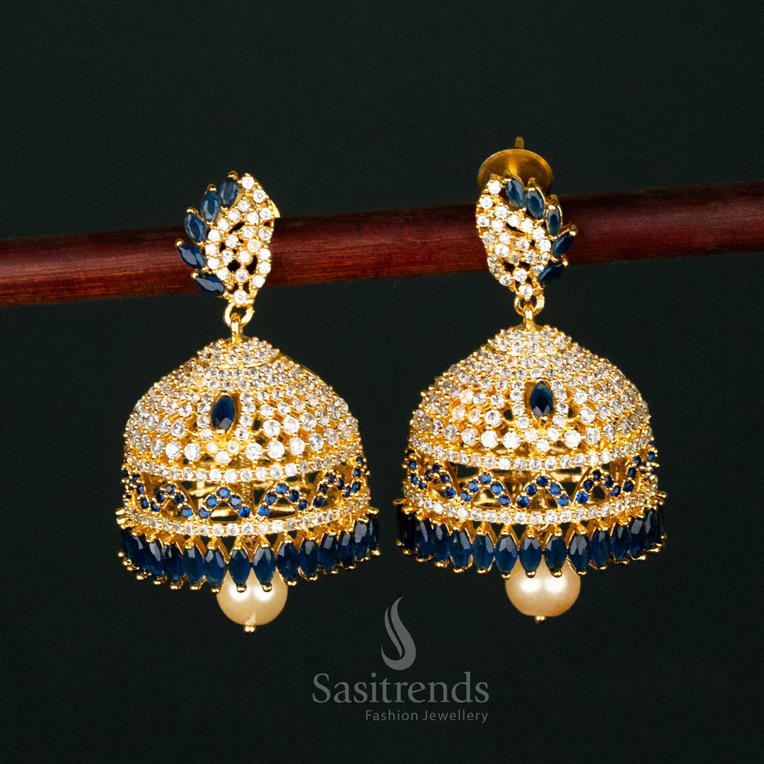 Ethnic micro gold plated jhumka earrings with brilliant white and blue AD stones, featuring a temple-inspired dome shape and a timeless heritage look - Sasitrends