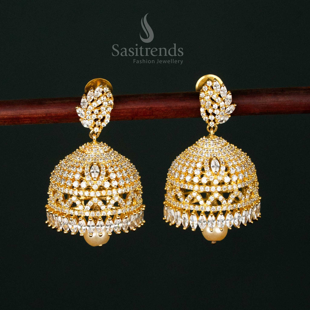 Elegant micro gold plated jhumka earrings adorned with shimmering white AD stones and a pearl drop - Sasitrends