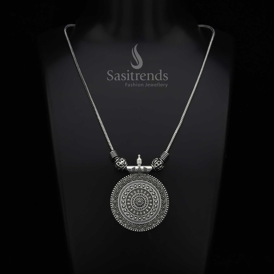 Radiant Roopasi oxidised silver chain necklace featuring a delicately carved small chakra pendant – a graceful tribal-style jewellery piece with rustic elegance for ethnic celebrations – Sasitrends