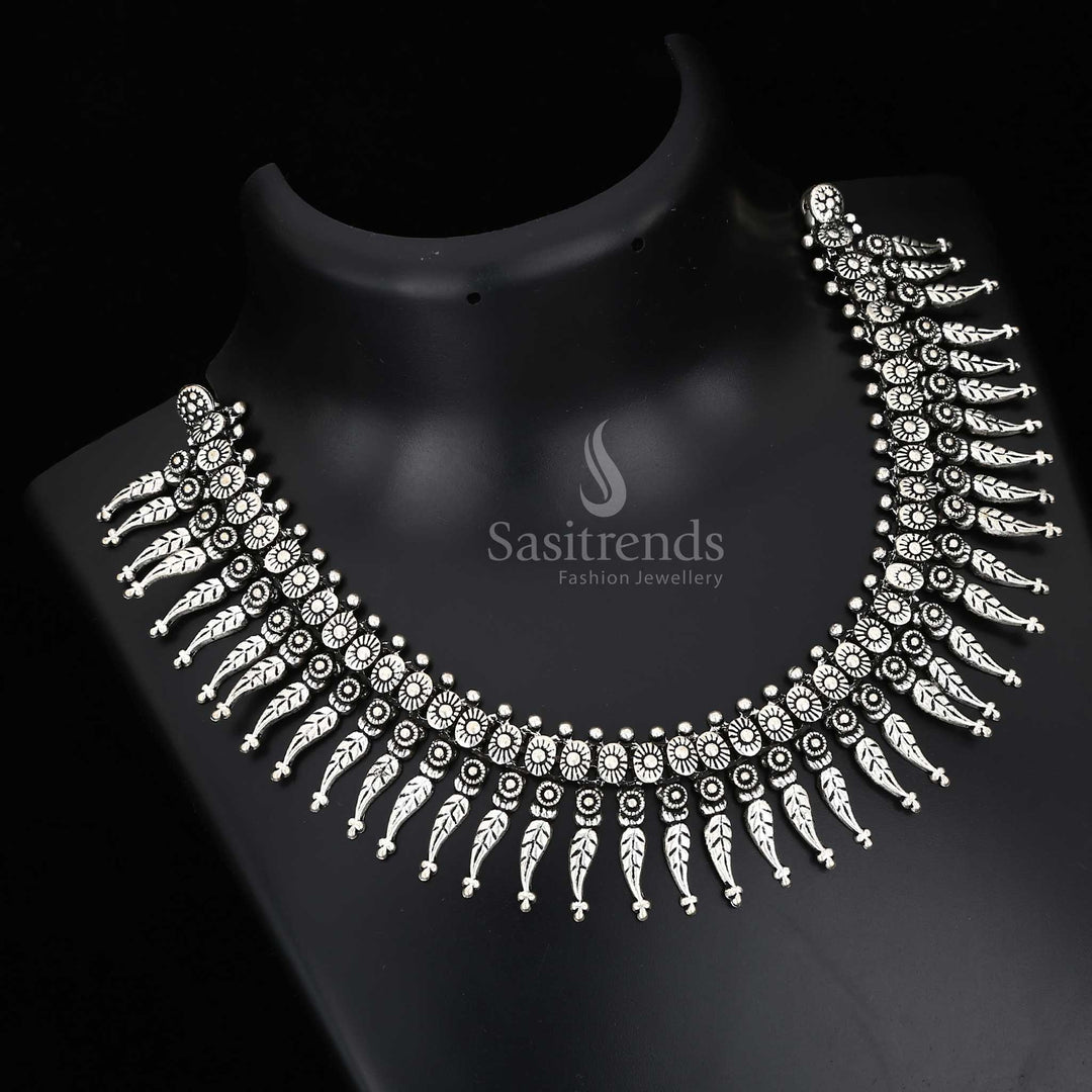 Echoing traditions in every curve – a Kolhapuri oxidised necklace with antique drops and a tribal fusion pendant, crafted for heritage jewellery styling – Sasitrends