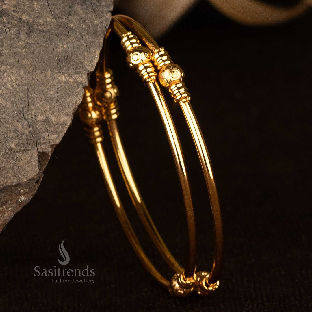 Minimalistic gold-plated Kada bangles with bead accents and circular structure - Sasitrends