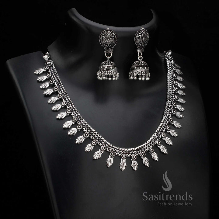 Rustic grandeur defines this oxidised handcrafted silver jewellery set featuring antique-style jhumka earrings – perfect for showcasing a traditional cultural look – Sasitrends
