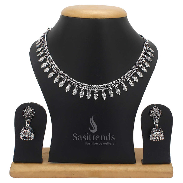 Majestic tradition inspired oxidised silver jewellery set with intricately carved patterns and classic jhumka earrings – a cultural ensemble crafted for festive grace – Sasitrends