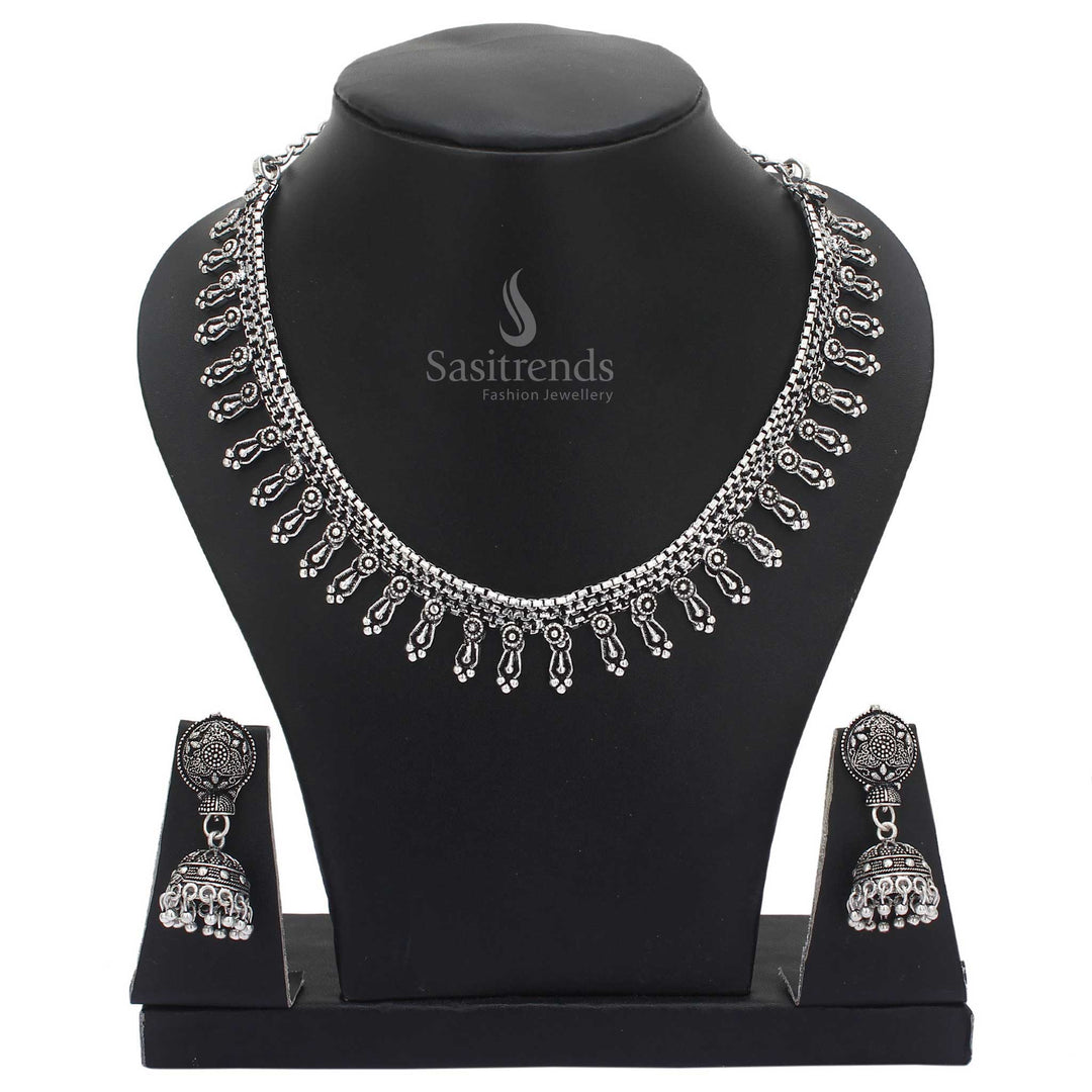 Royal grace oxidised silver jewellery set flaunting peacock motif and majestic jhumka earrings – a radiant choice for festive cultural wear – Sasitrends