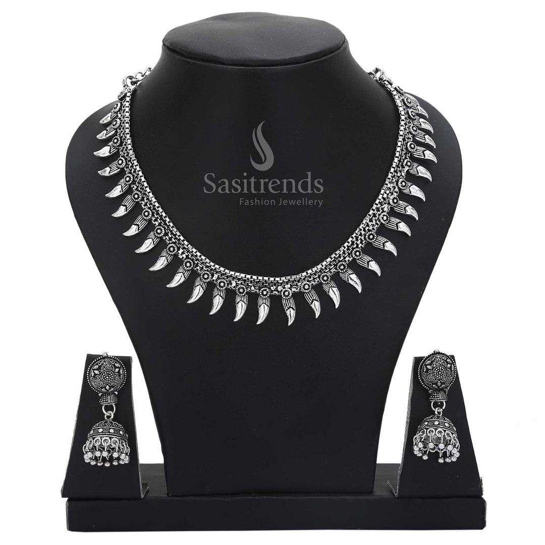 Vintage radiance in this oxidised silver jewellery set with round traditional jhumkas and symbolic motifs – crafted for meaningful cultural wear – Sasitrends