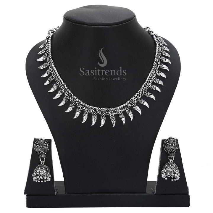 Vintage radiance in this oxidised silver jewellery set with round traditional jhumkas and symbolic motifs – crafted for meaningful cultural wear – Sasitrends