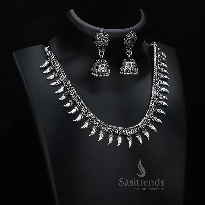 Temple charm shines through this oxidised silver jewellery set with paisley motifs and classic jhumkas – ideal for cultural ceremonies and festivals – Sasitrends