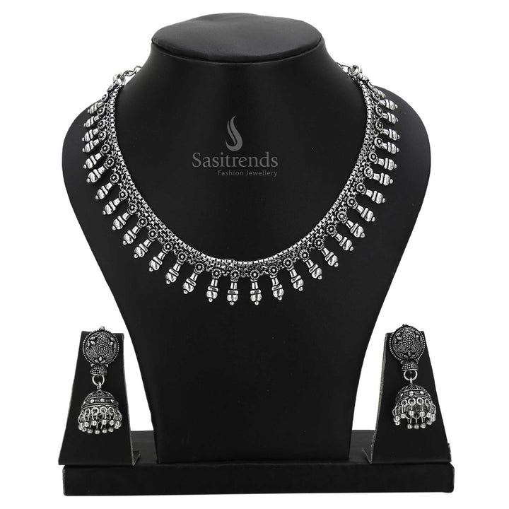 Royal aura in oxidised silver jewellery set with floral jhumkas and mirrored decorative motifs – crafted for festive cultural ensembles – Sasitrends