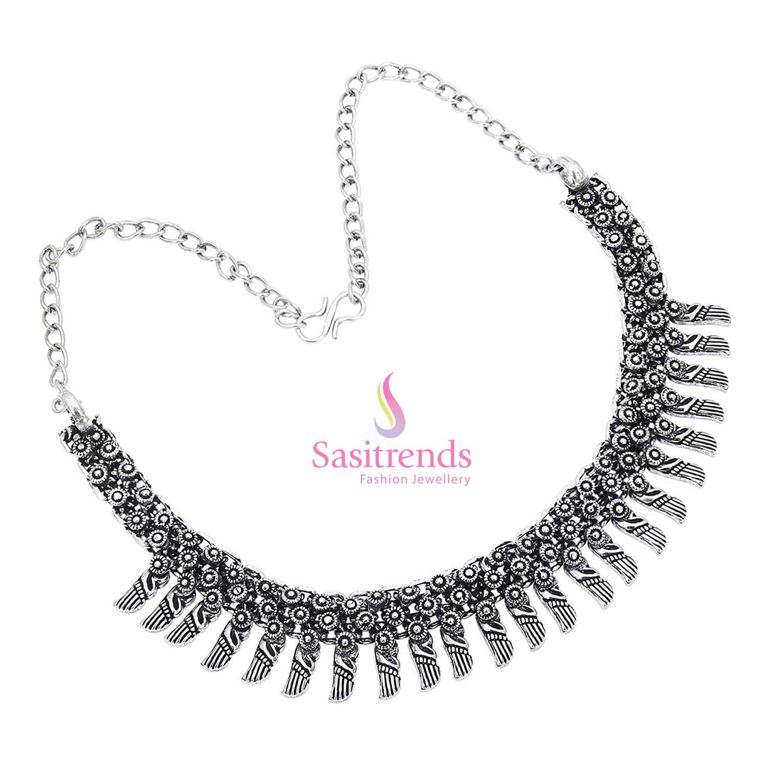 Divine solar dance glows in this oxidised silver necklace, etched with an embossed crescent frame and radiant sunburst centre – celestial jewellery for ethno-classic wear – Sasitrends