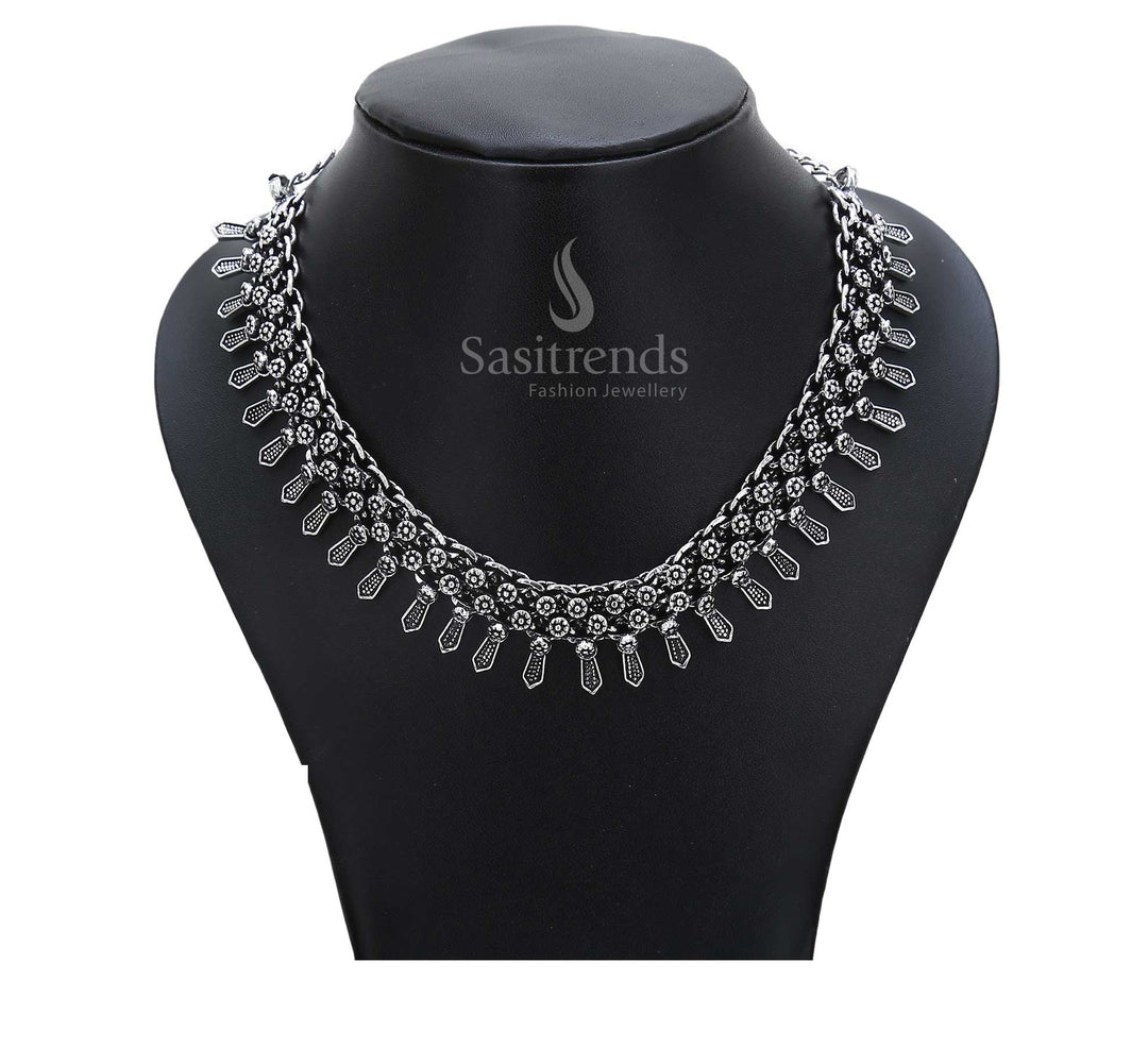 Eternal birthright echoed in oxidised vintage jewellery – tribal goddess pendant paired with textured silver orbs create ancestral grandeur – Sasitrends