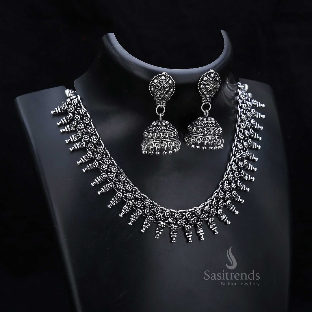 Heritage bride oxidised silver necklace and jhumka earrings jewellery set adorned with floral motifs – an elegant tribute to traditional bridal wear – Sasitrends