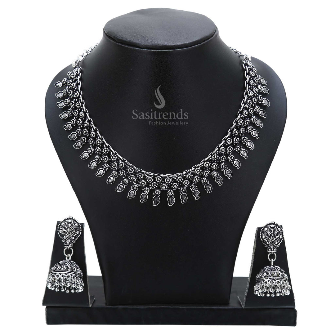 Classic craftsmanship embodied in this oxidised silver jewellery set with traditional jhumka earrings and vintage-style necklace – curated for ancestral functions – Sasitrends