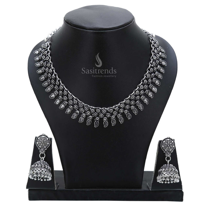 Classic craftsmanship embodied in this oxidised silver jewellery set with traditional jhumka earrings and vintage-style necklace – curated for ancestral functions – Sasitrends