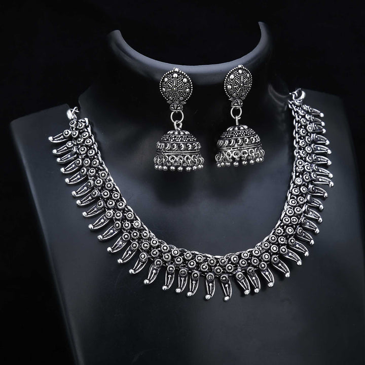 Royal temple art oxidised silver jewellery set adorned with goddess engravings and elegant jhumkas – perfect for traditional rituals and festive moments – Sasitrends