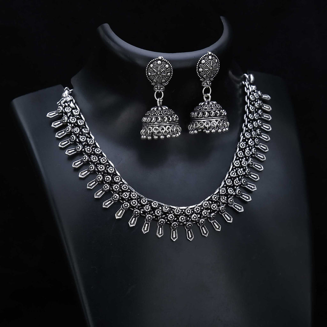 Sacred symbols oxidised silver necklace set with jhumka earrings and traditional ethnic patterns – ideal ritual jewellery for ancestral occasions – Sasitrends