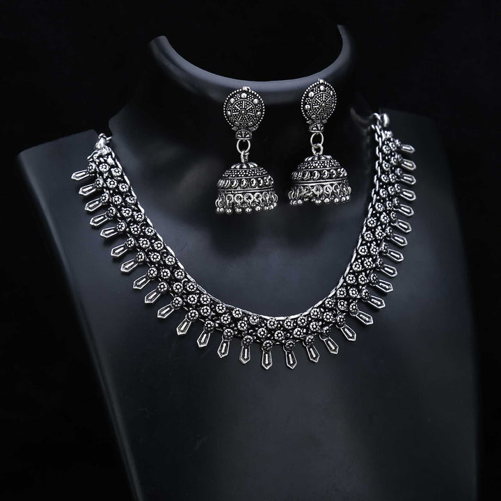 Sacred symbols oxidised silver necklace set with jhumka earrings and traditional ethnic patterns – ideal ritual jewellery for ancestral occasions – Sasitrends