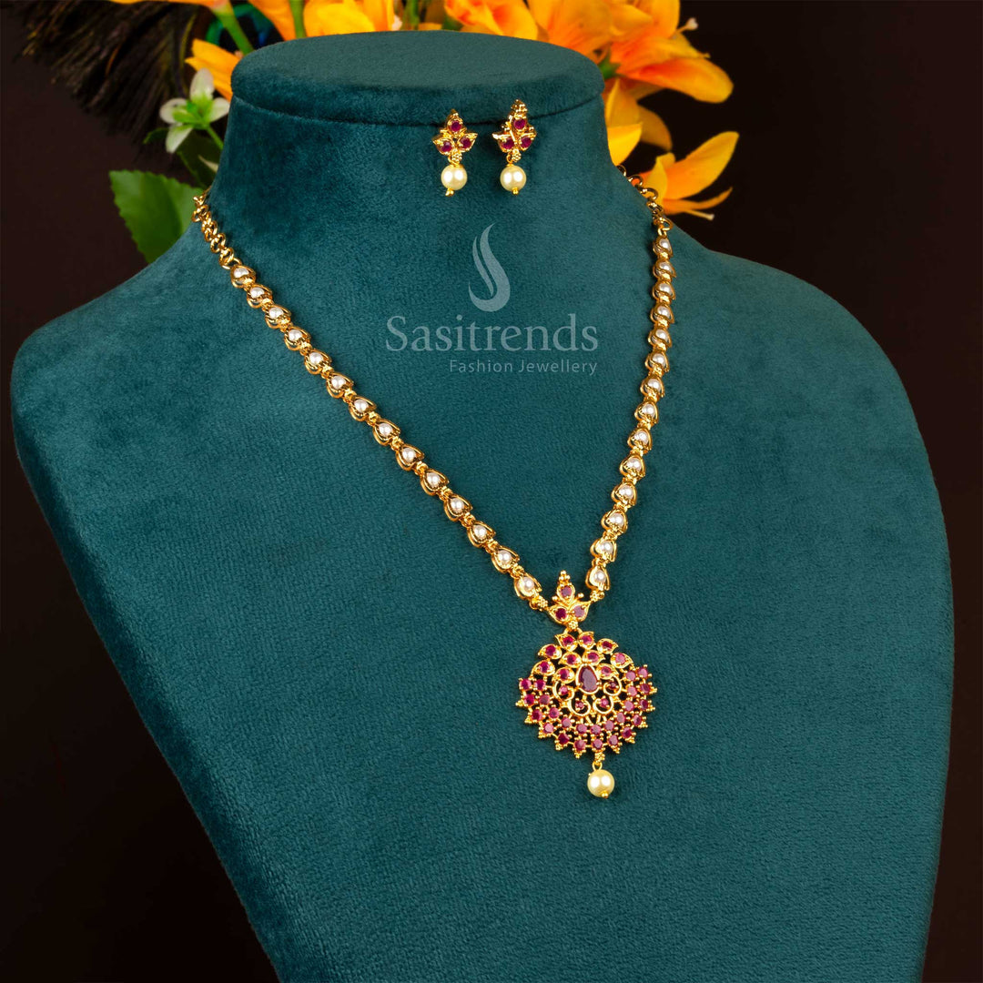Striking ruby floral pendant necklace set in micro gold plating with delicate pearl drops – a stunning bridal jewellery piece crafted for festive grandeur and timeless tradition – Sasitrends