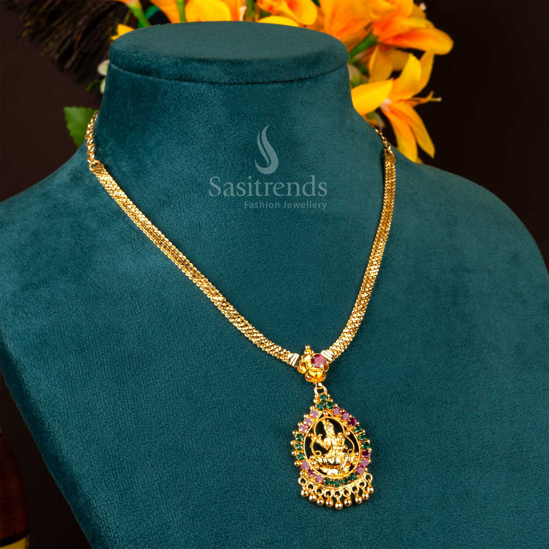 An ornate ruby-green Lakshmi necklace, micro gold plated, perfect for making a statement at festive celebrations, available from Sasitrends