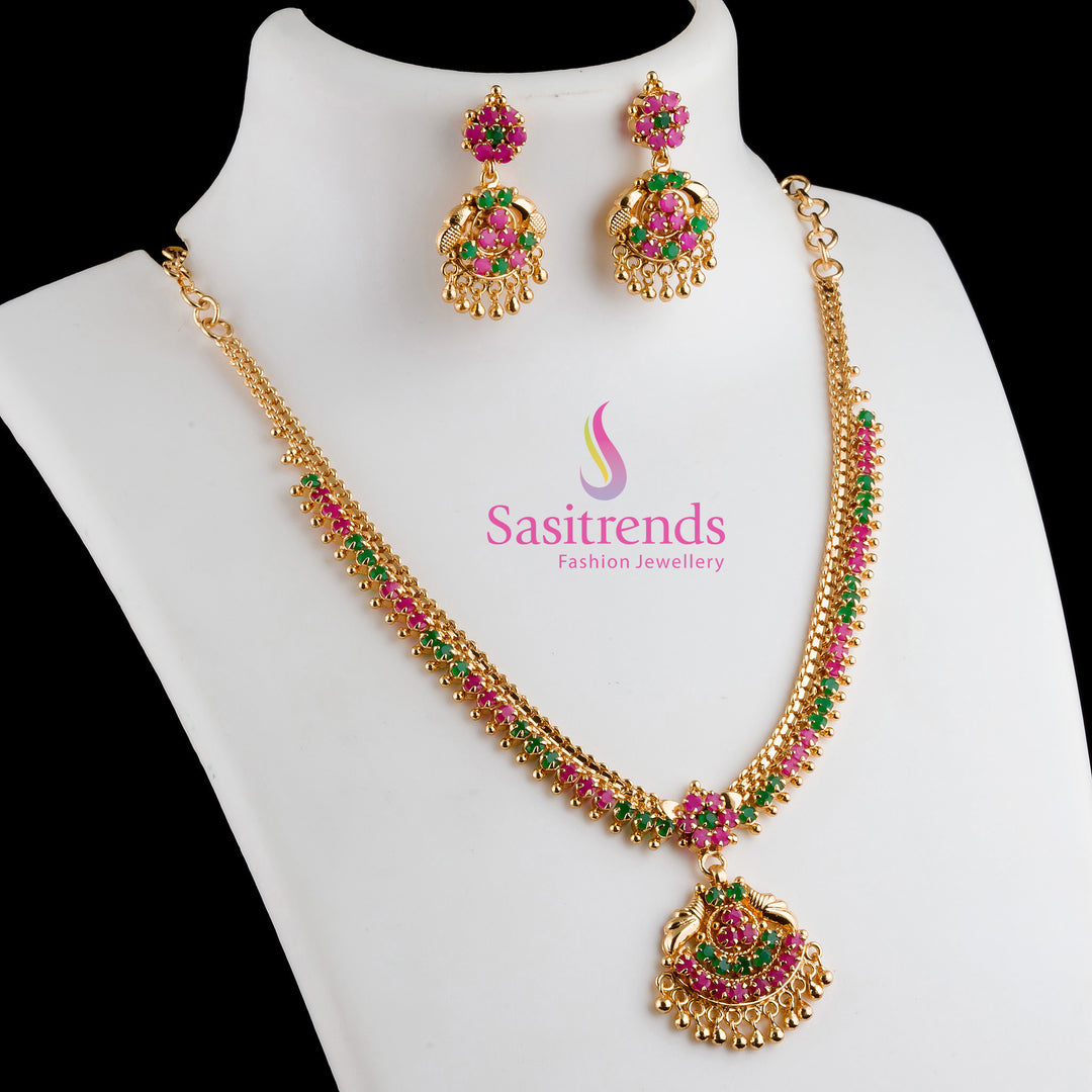 Heritage Ruby-Green AD Studded Flower Design Micro Gold-Plated Jewellery Set With Statement Necklace and Jhumka Earrings – A Traditional Splendour for Cultural Occasions by Sasitrends