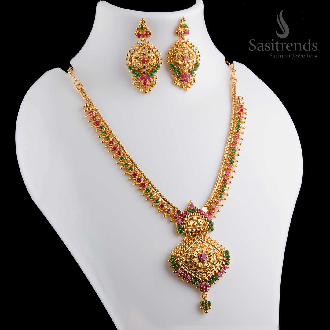 Gorgeous intricate micro gold plated ruby-green AD flower pendant necklace with earrings, featuring a polished finish and golden detailing - Sasitrends
