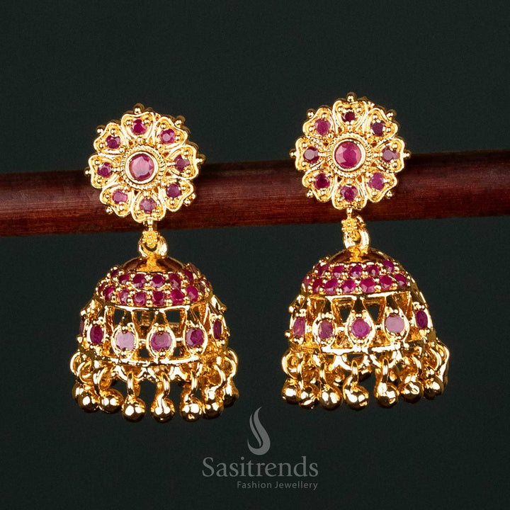 Opulent Traditional Wear Bloom-Inspired Jhumkas with Micro Gold Polish and Ruby Stone Accents for Ethnic Glam - Sasitrends