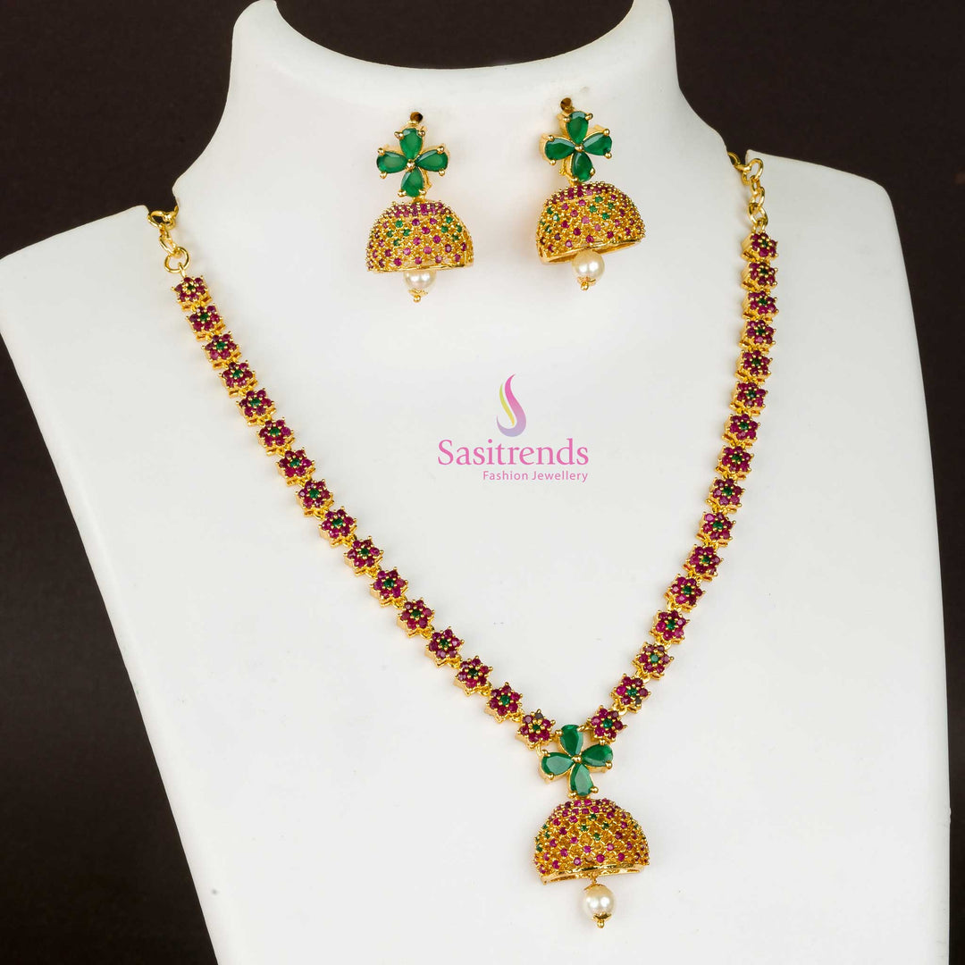 Antique Finish Gold-Plated Bell Jhumka Earrings Set featuring Ruby and Green American Diamond Stones – A Perfect Ethnic Party Wear Jewellery Piece - Sasitrends