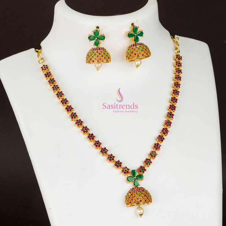 Antique Finish Gold-Plated Bell Jhumka Earrings Set featuring Ruby and Green American Diamond Stones – A Perfect Ethnic Party Wear Jewellery Piece - Sasitrends