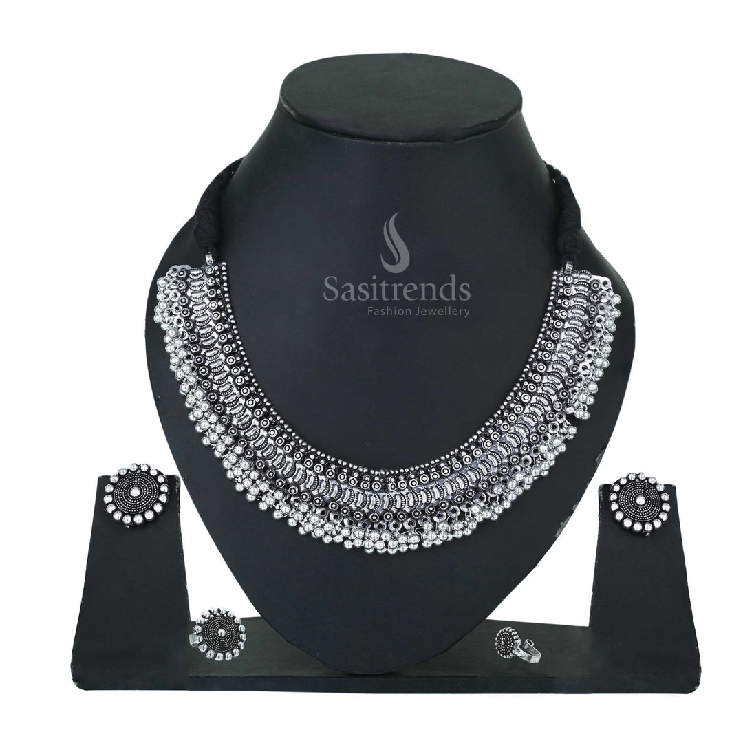 Sacred Bloom oxidised silver choker set detailed with kemp stone earrings, traditional ring and matching temple nosepin – Sasitrends