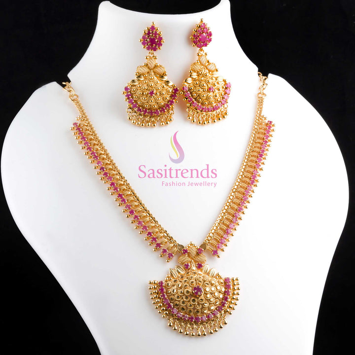 Stunning ruby Tilak motif micro gold polished necklace and earrings jewellery set featuring American diamond sparkle, ideal for bridal style and grand celebrations – Sasitrends
