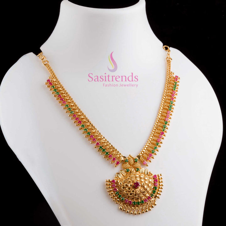 Traditional dual-tone ruby-green Tilak-style micro gold plated necklace with AD stones, radiating festive grace and perfect for ethnic charm – Sasitrends