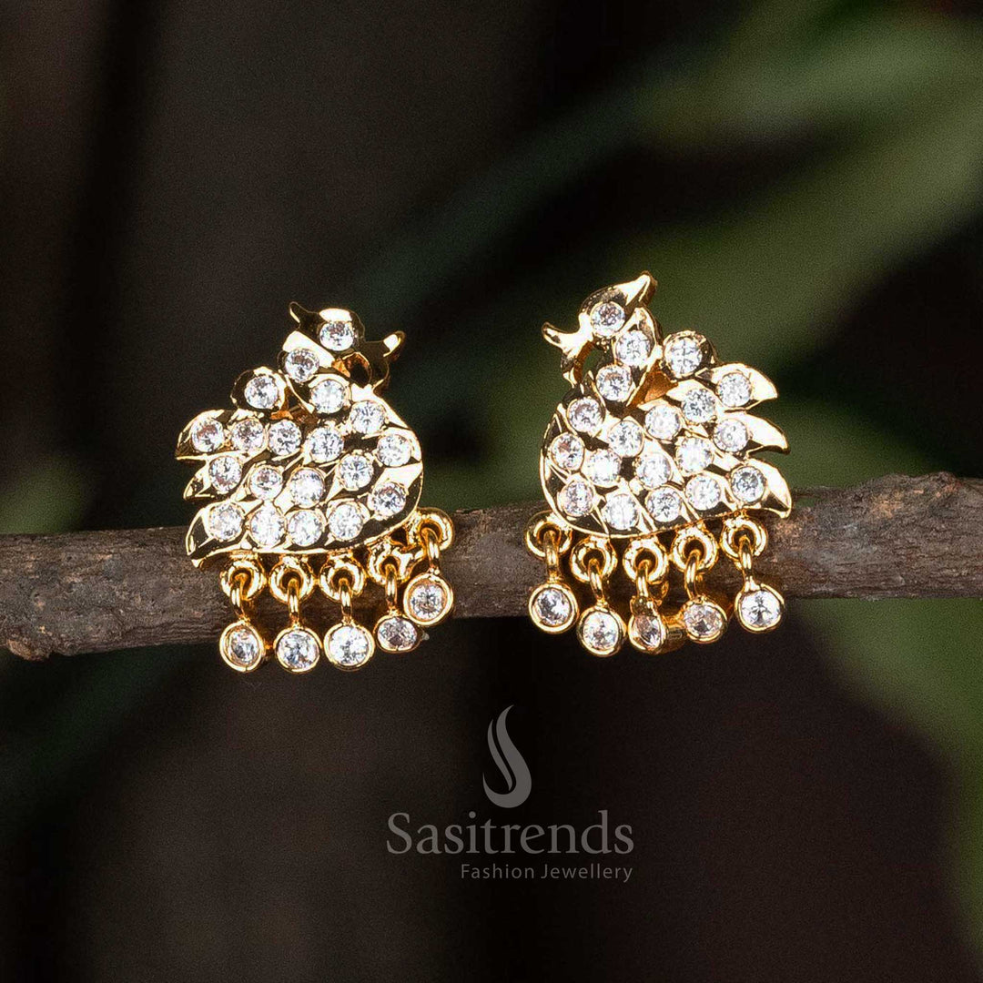 Temple-style brass Impon earrings with white AD stones, pearl dewdrop hangings, and rich micro gold plating – A divine blend of heritage and elegance in ethnic jewellery – Sasitrends