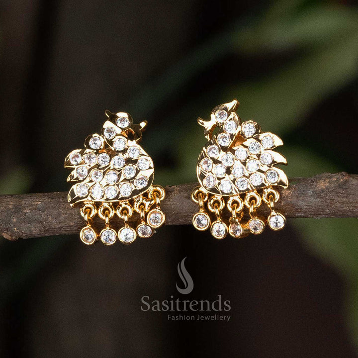 Temple-style brass Impon earrings with white AD stones, pearl dewdrop hangings, and rich micro gold plating – A divine blend of heritage and elegance in ethnic jewellery – Sasitrends