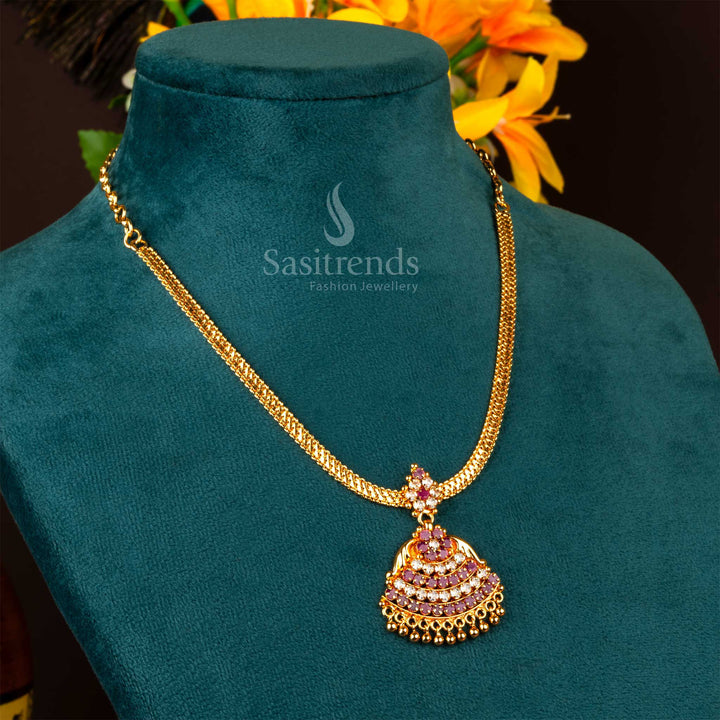 Chic and charming necklace in white and ruby stone blend with micro gold plating and bell-shaped drops – styled to elevate bridal temple jewellery fashion – Sasitrends
