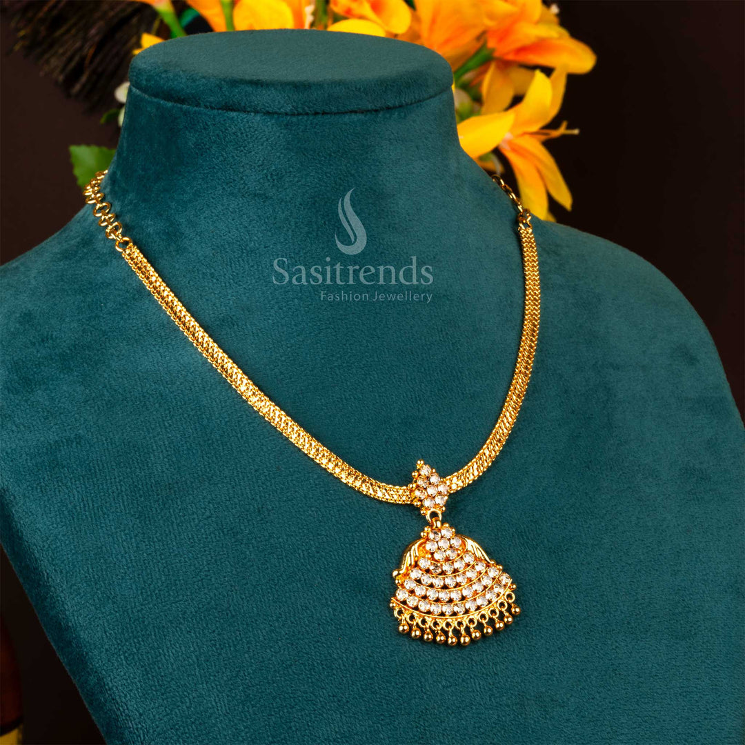 One gram gold plated necklace with snow-white stones, blooming floral centre, and antique-style bell pendant – a pure choice for graceful festive jewellery – Sasitrends
