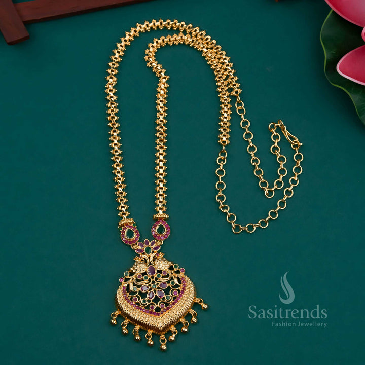 Stunning long Gajiri necklace in micro gold finish with majestic peacock pendant and shimmering American diamond stones – ideal for ethnic bridal jewellery collections – Sasitrends