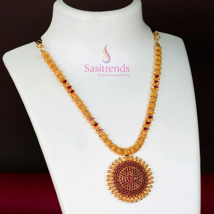 Royal ruby gleam in this micro gold plated sun locket necklace with radiant American diamond detailing and floral embellishments – an elegant wedding jewellery piece – Sasitrends