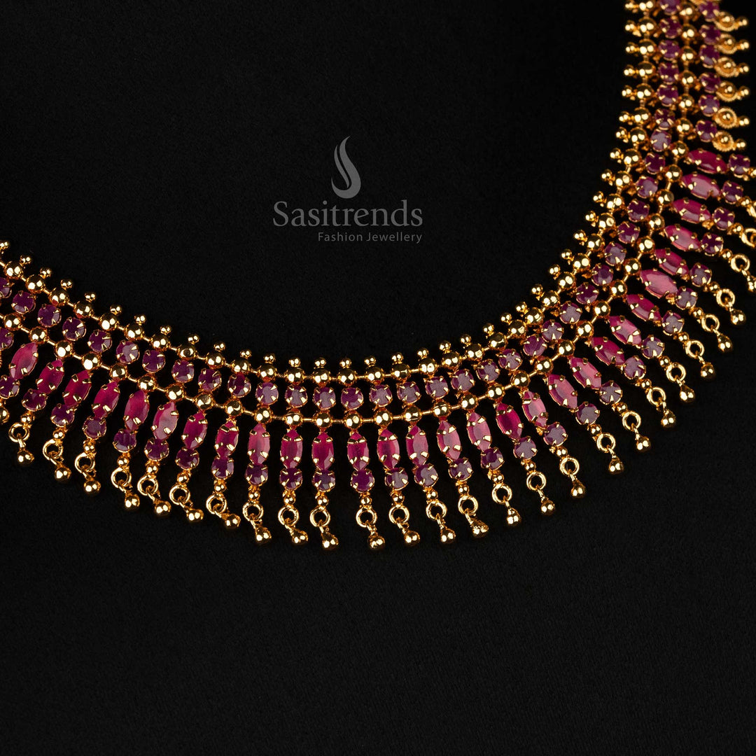 Radiant micro gold-plated necklace featuring ruby stones and intricate golden ball accents, perfect for traditional events and ethnic wear - Sasitrends