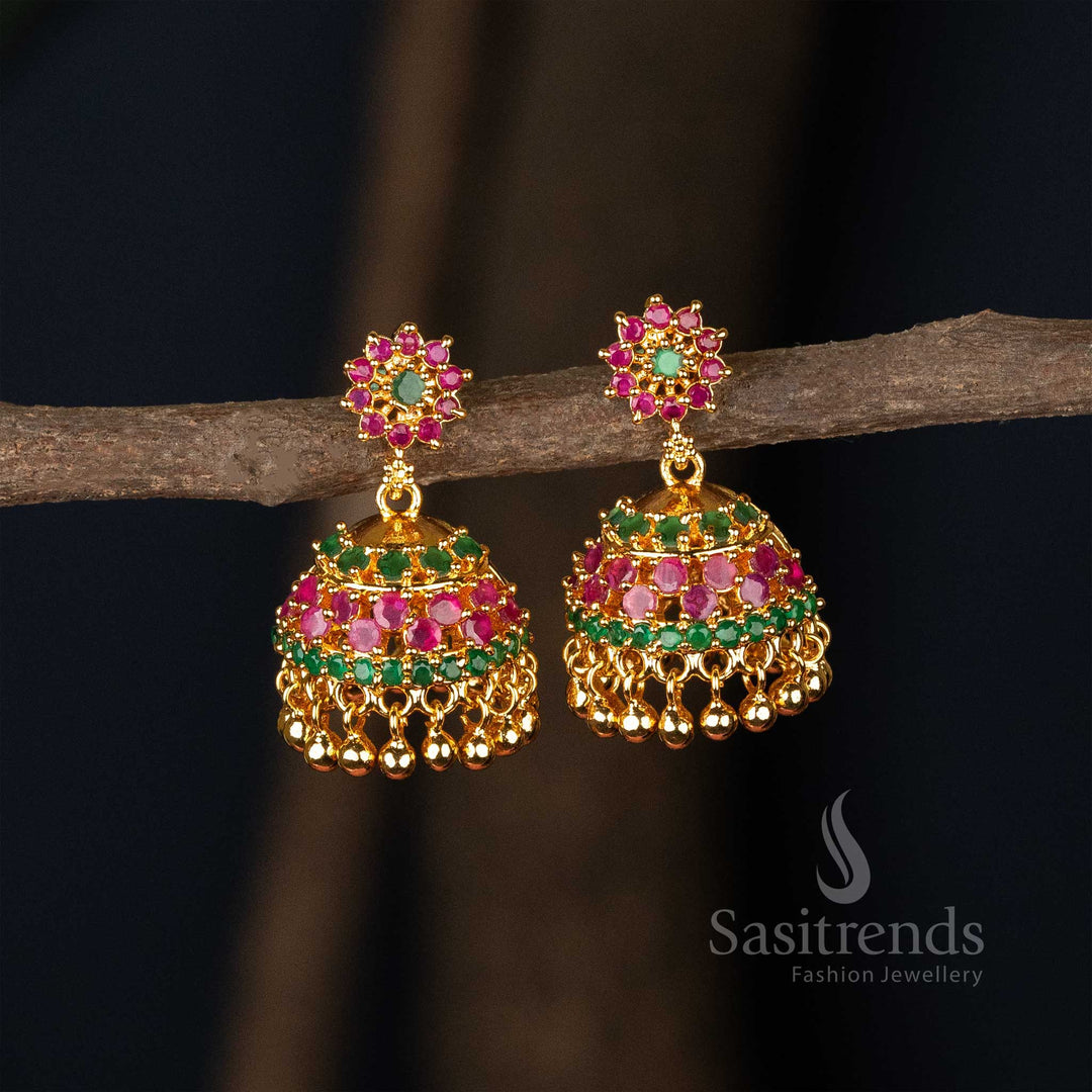 Gorgeous ruby-green traditional jhumka earrings in micro gold polish adorned with kemp stone work and festive pearl lines – crafted for ethnic elegance – Sasitrends