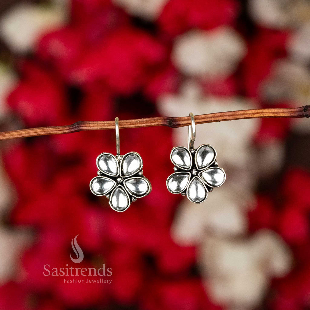 Latest oxidised petal-shaped earrings with white stone accents on fishhook backs