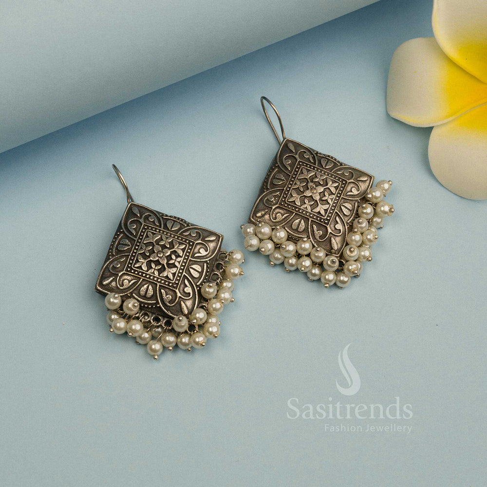 Elegant oxidised silver look like earrings with pearl drops, crafted for festive gatherings and stylish party wear jewellery collections – Sasitrends