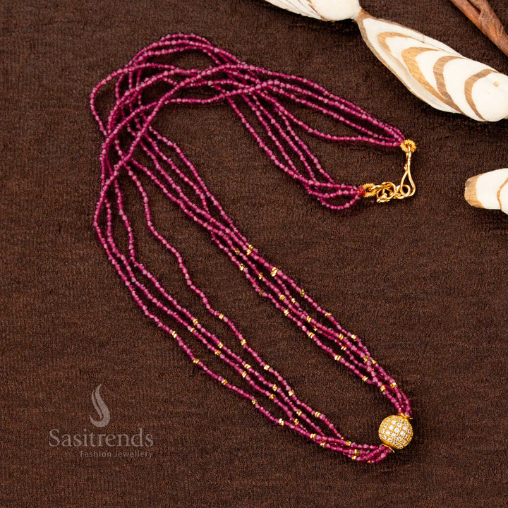 An exquisite one gram gold plated long necklace showcasing a handcrafted bold pendant, enriched with vibrant pink gemstone ornaments, an artistic jewellery masterpiece - Sasitrends
