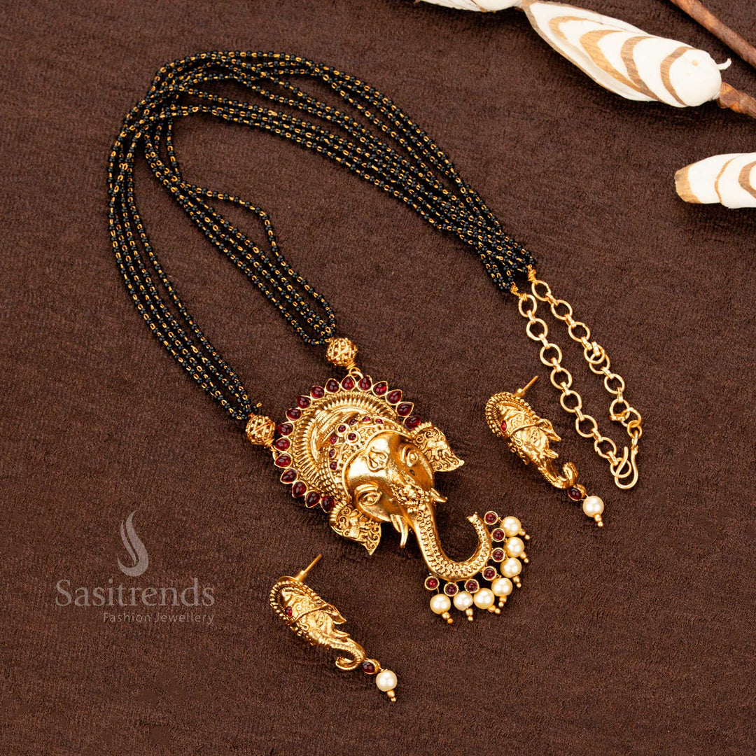 Divine ruby Ganesha pendant in a matte gold finish mangalsutra necklace set, temple-style jewellery ideal for weddings, spiritual ceremonies, and festive occasions - Sasitrends