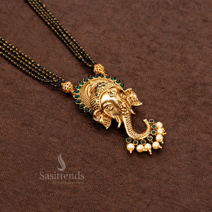 Handcrafted Ganesha mangalsutra in matte gold, featuring exquisite green stone embellishments — an authentic Indian jewellery set radiating purity and grace - Sasitrends