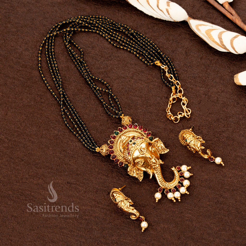 Traditional matte gold Ganesh pendant necklace mangalsutra featuring dual-hue ruby-green stone highlights, an iconic Indian jewellery set for grace and heritage - Sasitrends