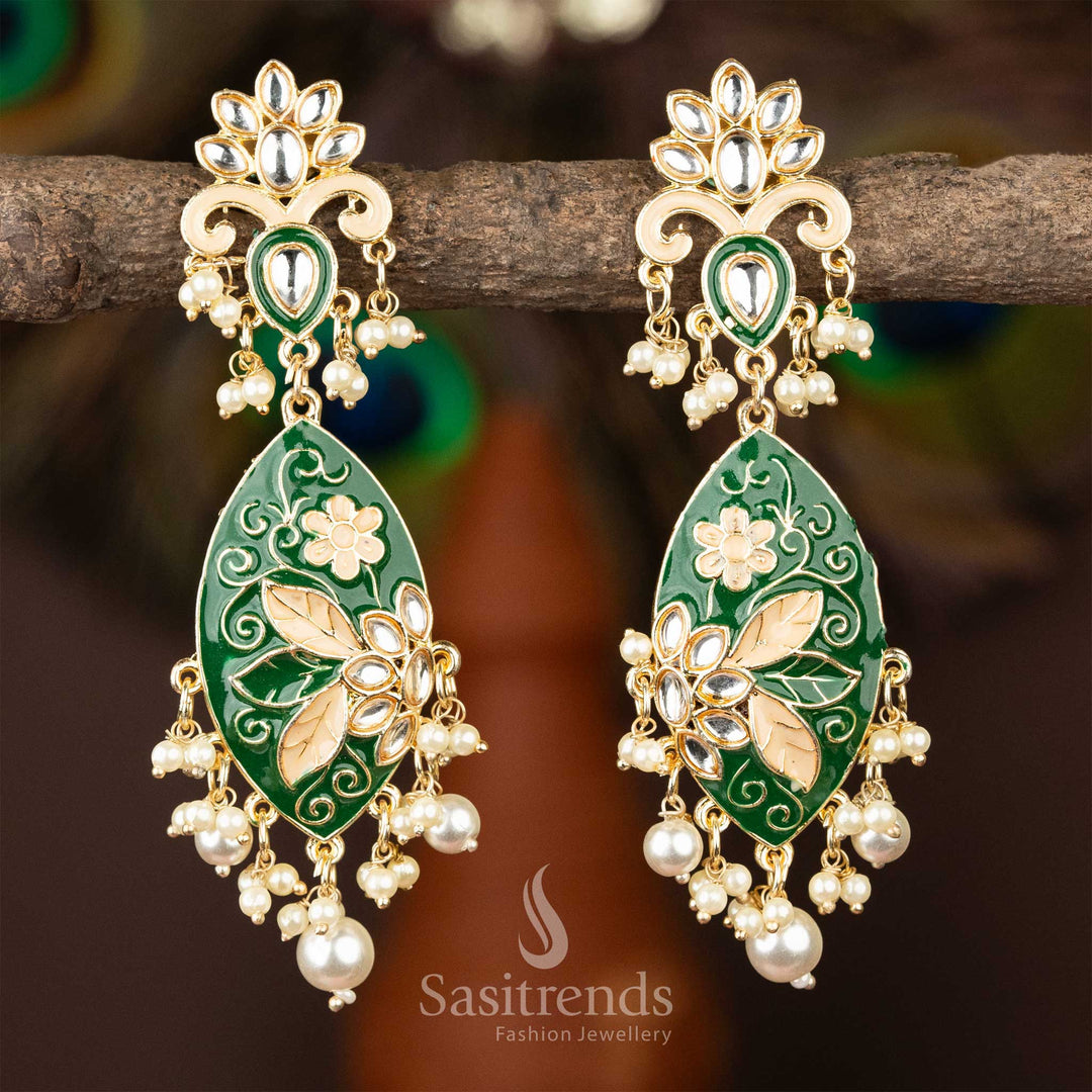 Elegant dark green enamel kundan earrings with gold plating and lustrous pearls.